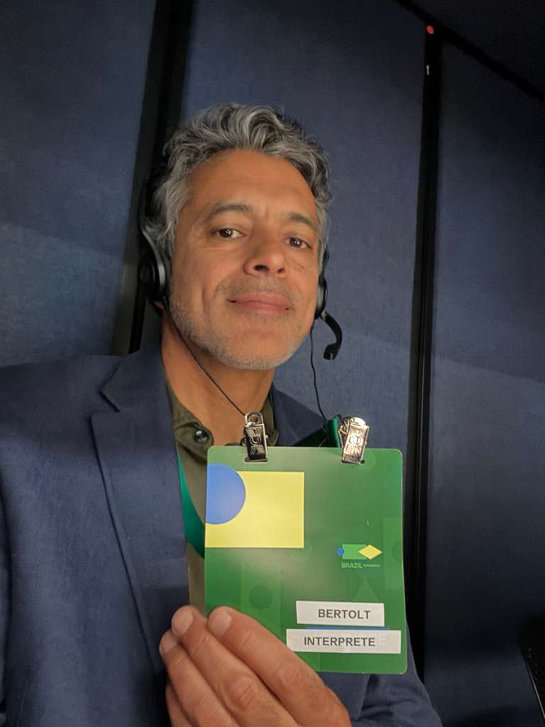 Bertolt with credentialed interpreter badge