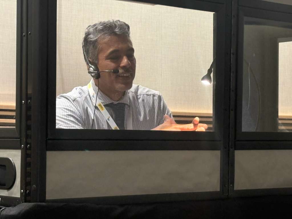 Bertolt interpreting in simultaneous booth